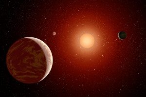 Immagine artistica di un sistema planetario composto da 3 pianeti che orbitano attorno a una nana rossa